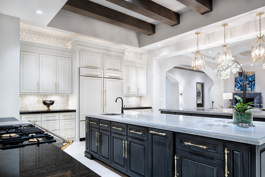 A kitchen space illuminated by Lutorn lighting fixtures.